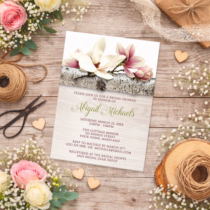 Magnolia Birch Light Wood Floral Bridal Shower Invitation on a wooden surface with flowers and twine.