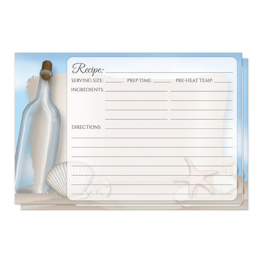 Recipe cards with a glass bottle, sand, seashells, and blue sky design