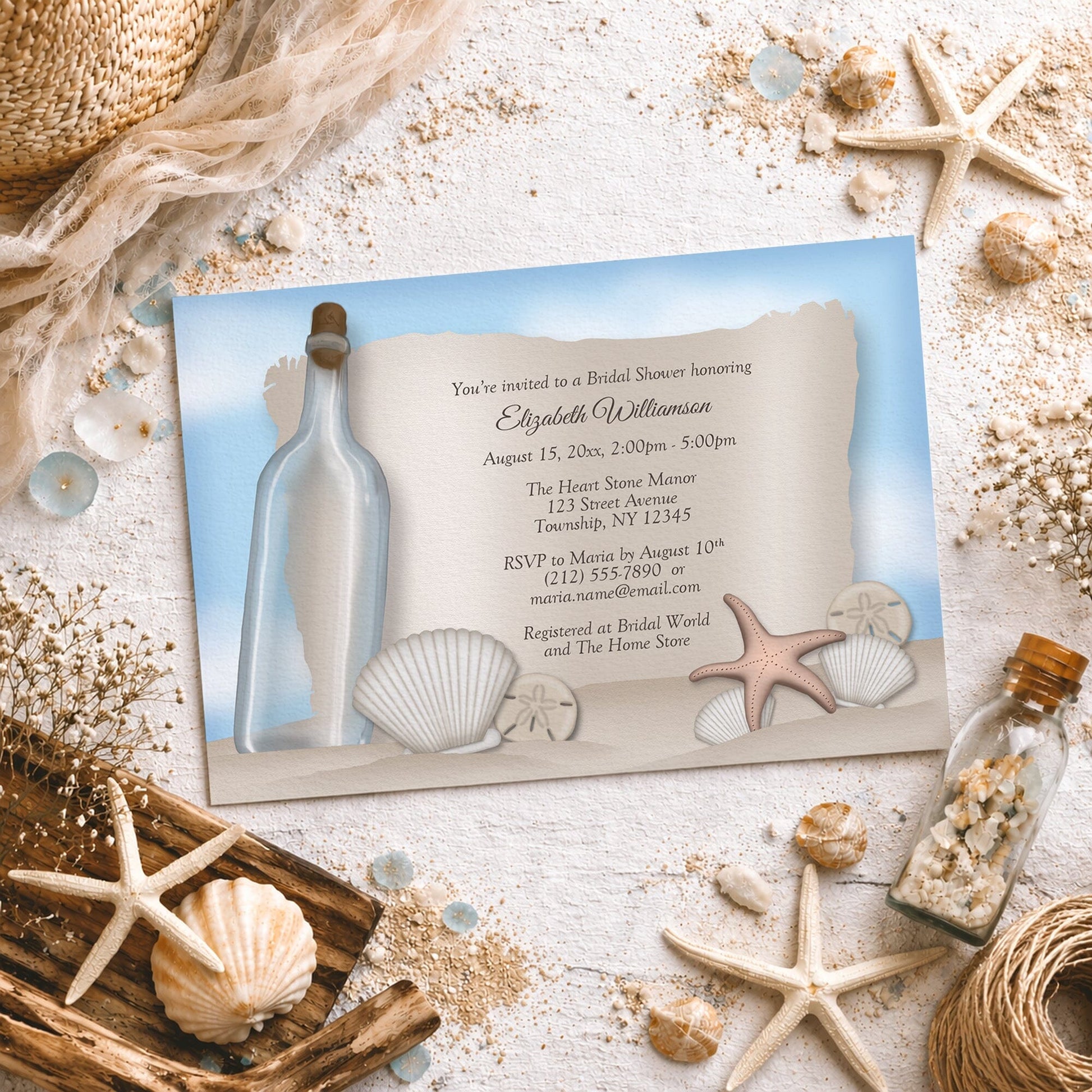 Seashell-themed Message from a Bottle Beach Bridal Shower Invitation on a sandy background