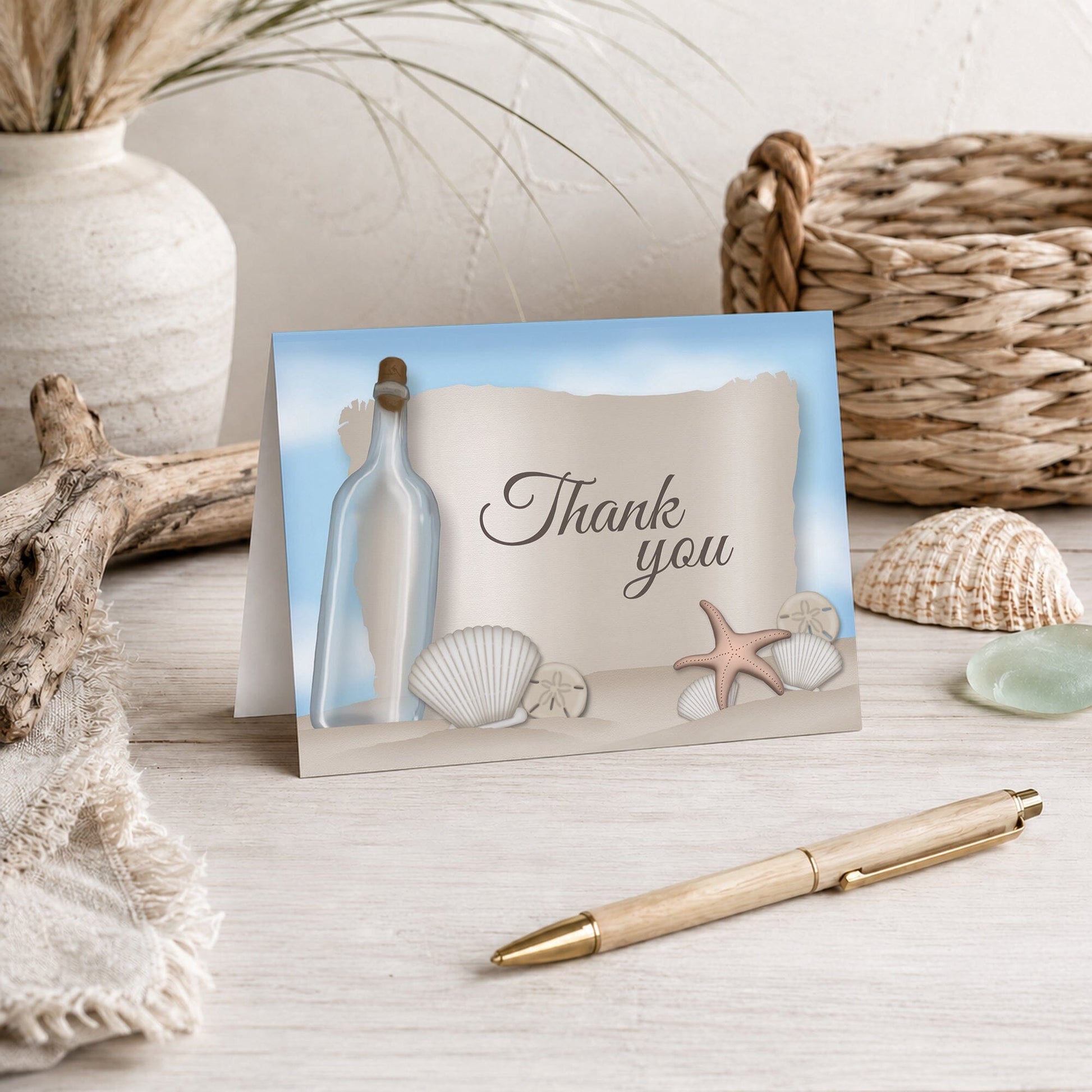 Message from a Bottle Beach Thank You Card shown on a tabletop with a vase, beach house decor, and a pen.