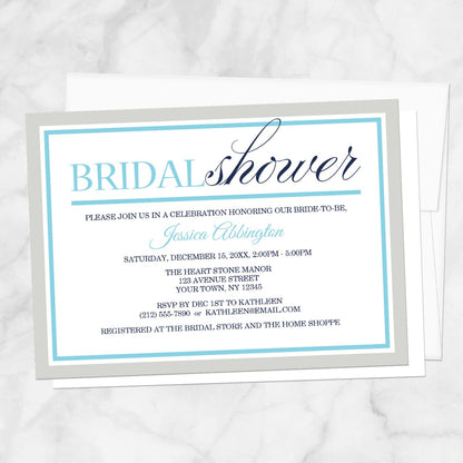 Modern Aqua Navy Gray Winter Bridal Shower Invitation on a marble surface with a white envelope.