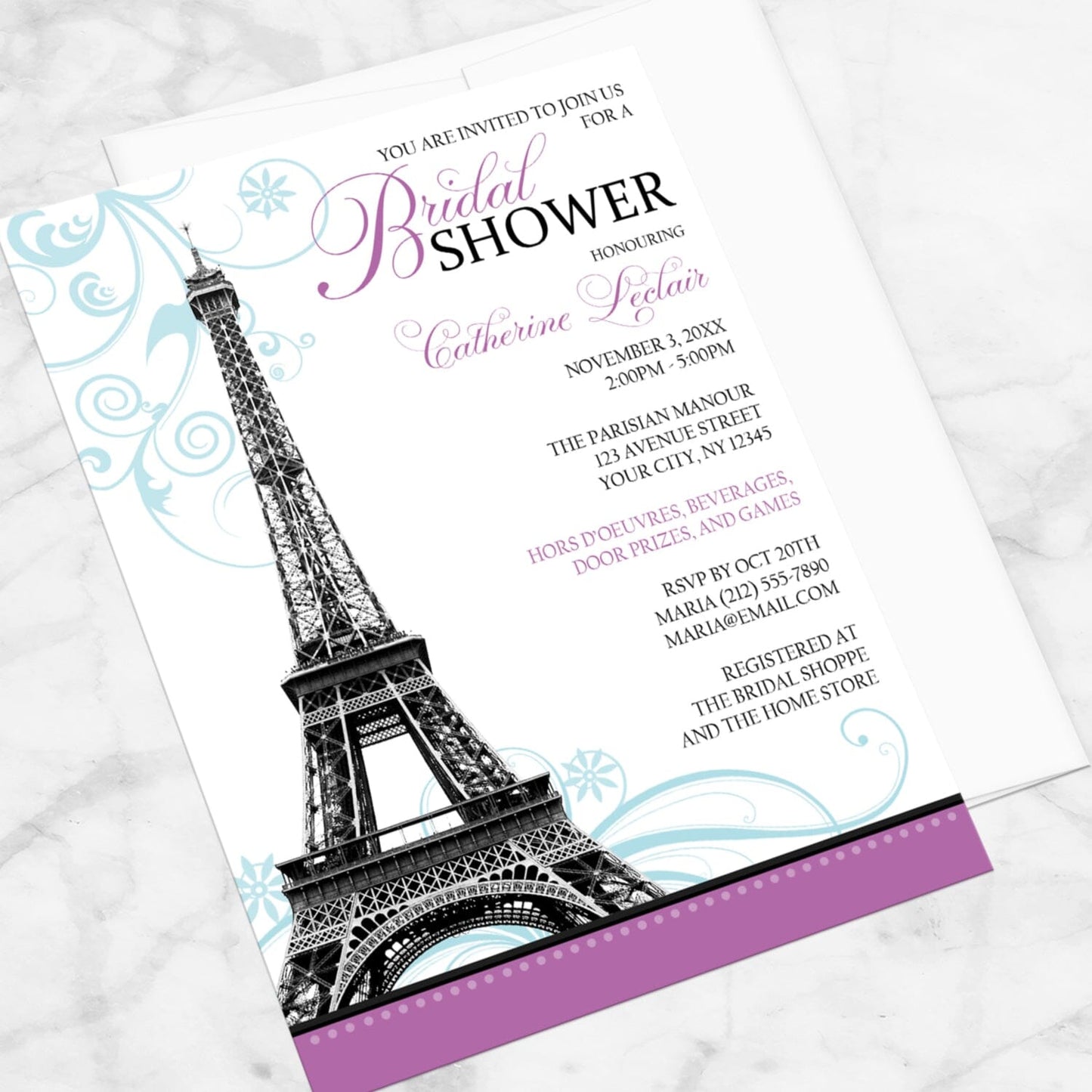 Modern Eiffel Tower Purple Parisian Bridal Shower Invitation shown at an angle on a marble surface with a white envelope.