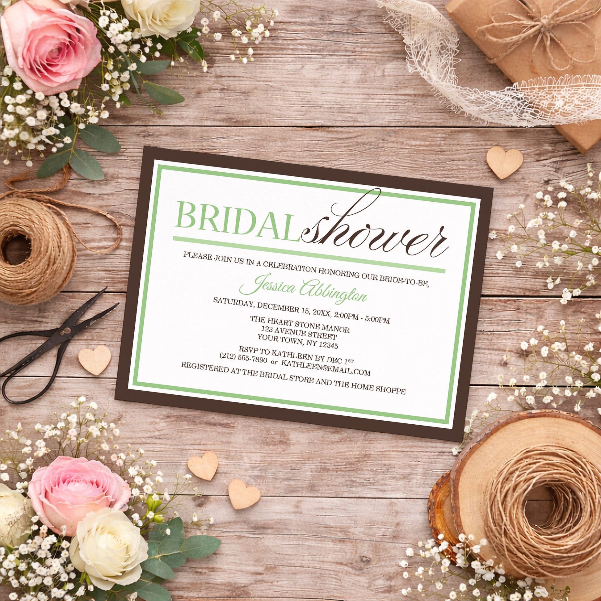 Modern Green and Brown Bridal Shower Invitation shown on a country-style wooden surface with spring and summer flowers, small wood hearts, and twine.