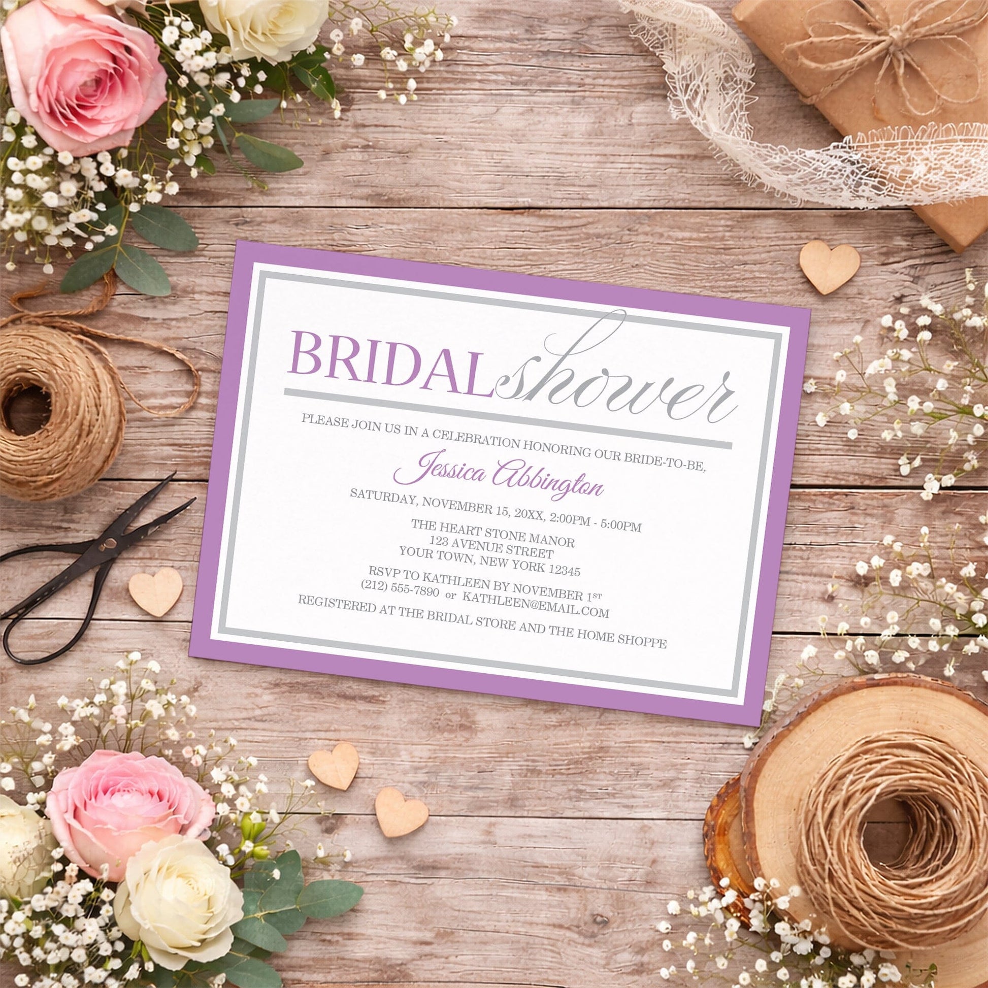 Modern Purple and Gray Bridal Shower Invitation shown on a country-inspired wooden surface with spring and summer flowers, small wood hearts, lace ribbon, and twine.