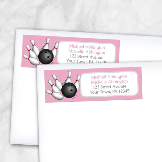 2 Pink Bowling Return Address Labels shown on white envelopes on a marble surface
