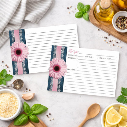 Set of Pink Daisy Lace Rustic Denim Recipe Cards on a kitchen counter with ingredients.
