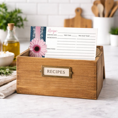 Wooden recipe box with a Pink Daisy Lace Rustic Denim Recipe Card on a kitchen counter