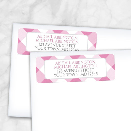 2 Pink Gingham Address Labels shown on white envelopes on a marble surface