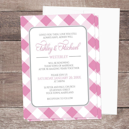 Pink Gingham Vow Renewal Invitation shown on a brown wood surface with a white envelope.