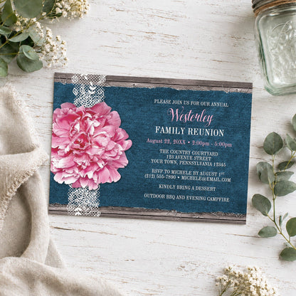 Pink Peony Denim and Lace Rustic Family Reunion Invitation shown on a wooden surface with plants and a small mason jar.
