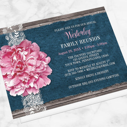 Pink Peony Denim and Lace Rustic Family Reunion Invitation shown at an angle on a marble surface with a white envelope.
