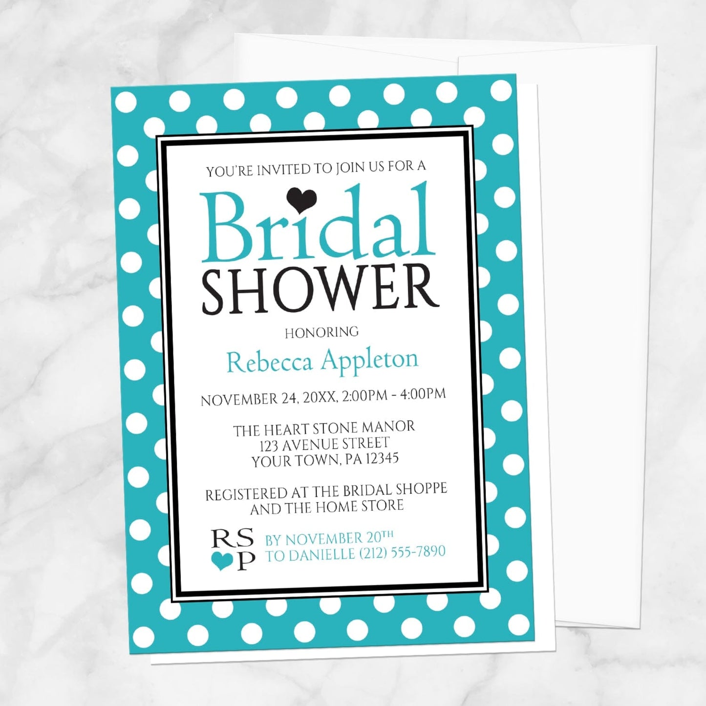 Polka Dot Turquoise Black and White Bridal Shower Invitation shown on a marble surface with a white envelope.