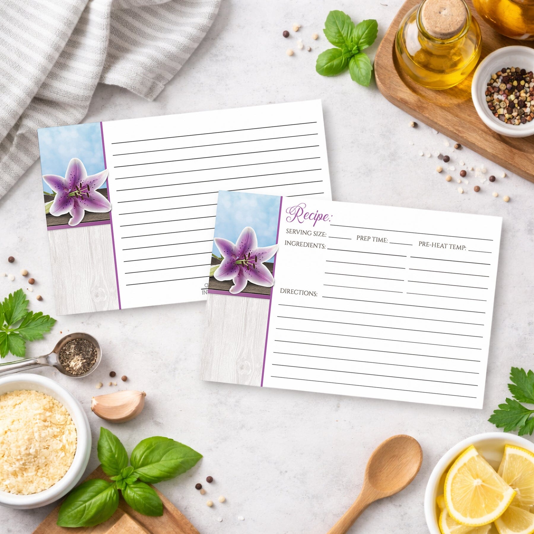 Set of Pretty Floral Wood Purple Lily Recipe Cards on a kitchen counter with ingredients.