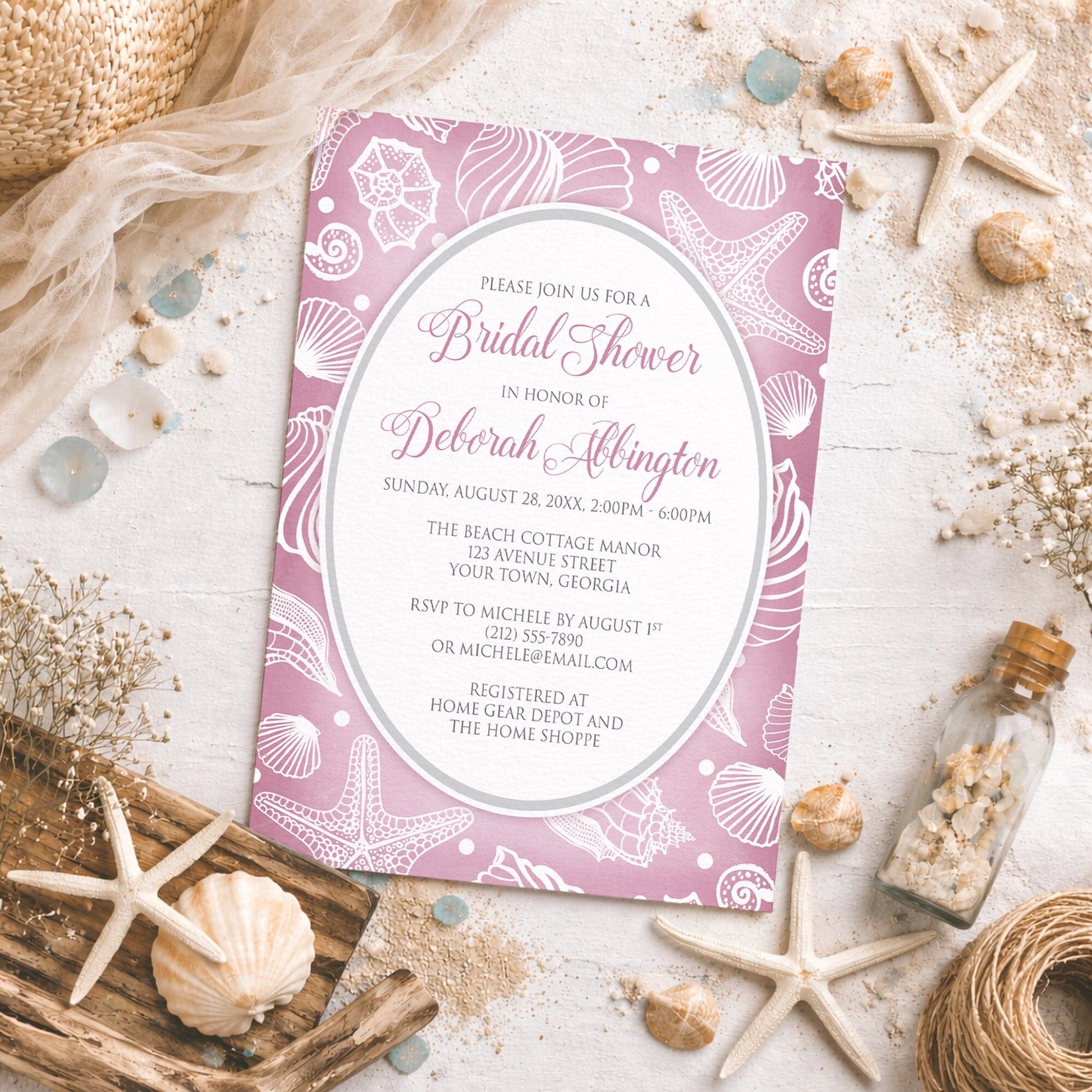 Pretty Pink Beach Seashell Bridal Shower Invitation with a pink seashell pattern shown on a beach-themed background with coastal decor.
