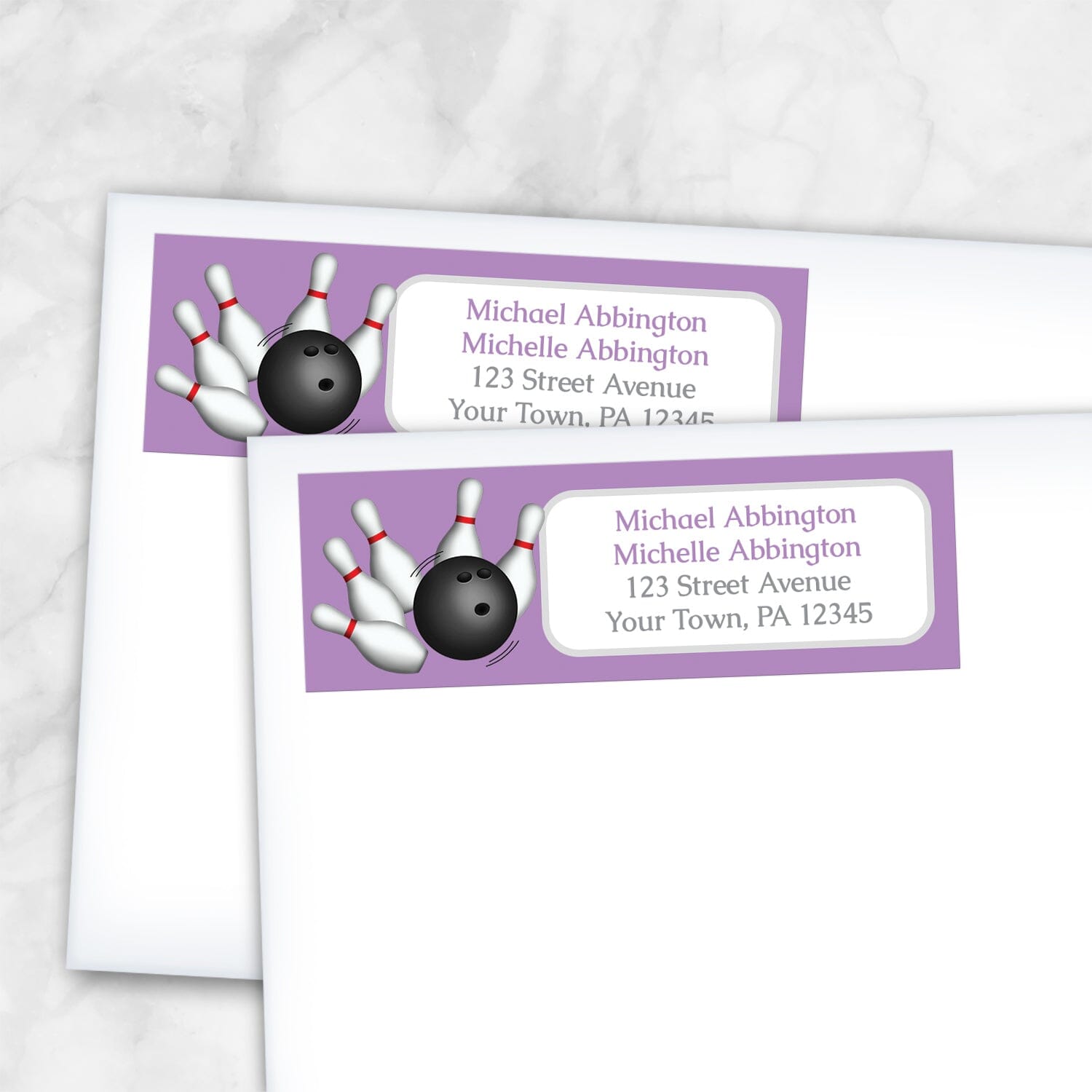2 Purple Bowling Return Address Labels shown on white envelopes on a marble surface