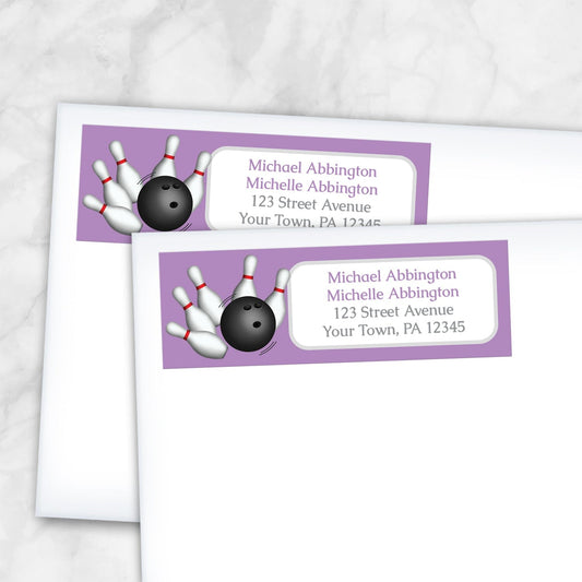 2 Purple Bowling Return Address Labels shown on white envelopes on a marble surface