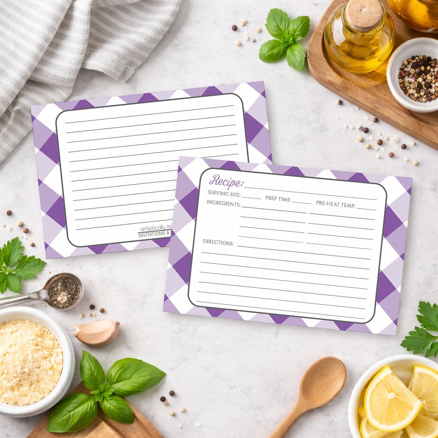 Two Purple Gingham Recipe Cards with purple checkered borders on a kitchen counter with ingredients.