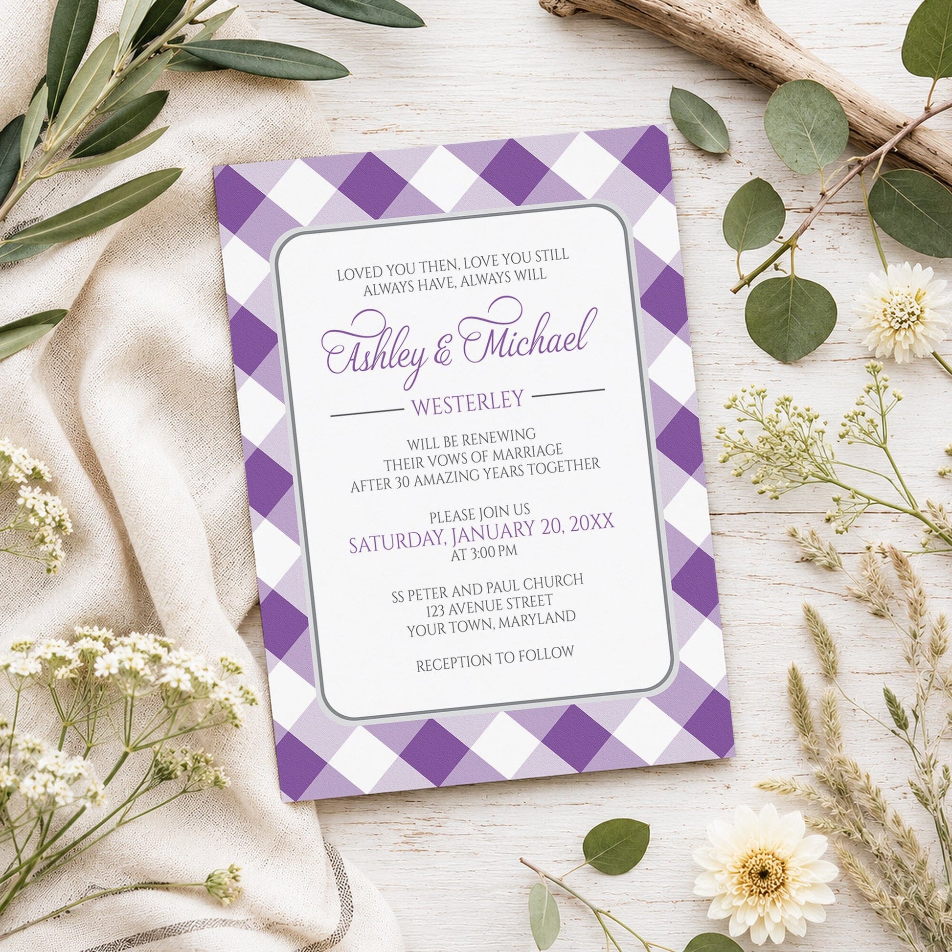 Purple Gingham Vow Renewal Invitation shown on a light wooden surface with spring and summer plants.