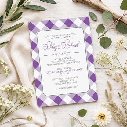 Purple Gingham Vow Renewal Invitation shown on a light wooden surface with spring and summer plants.