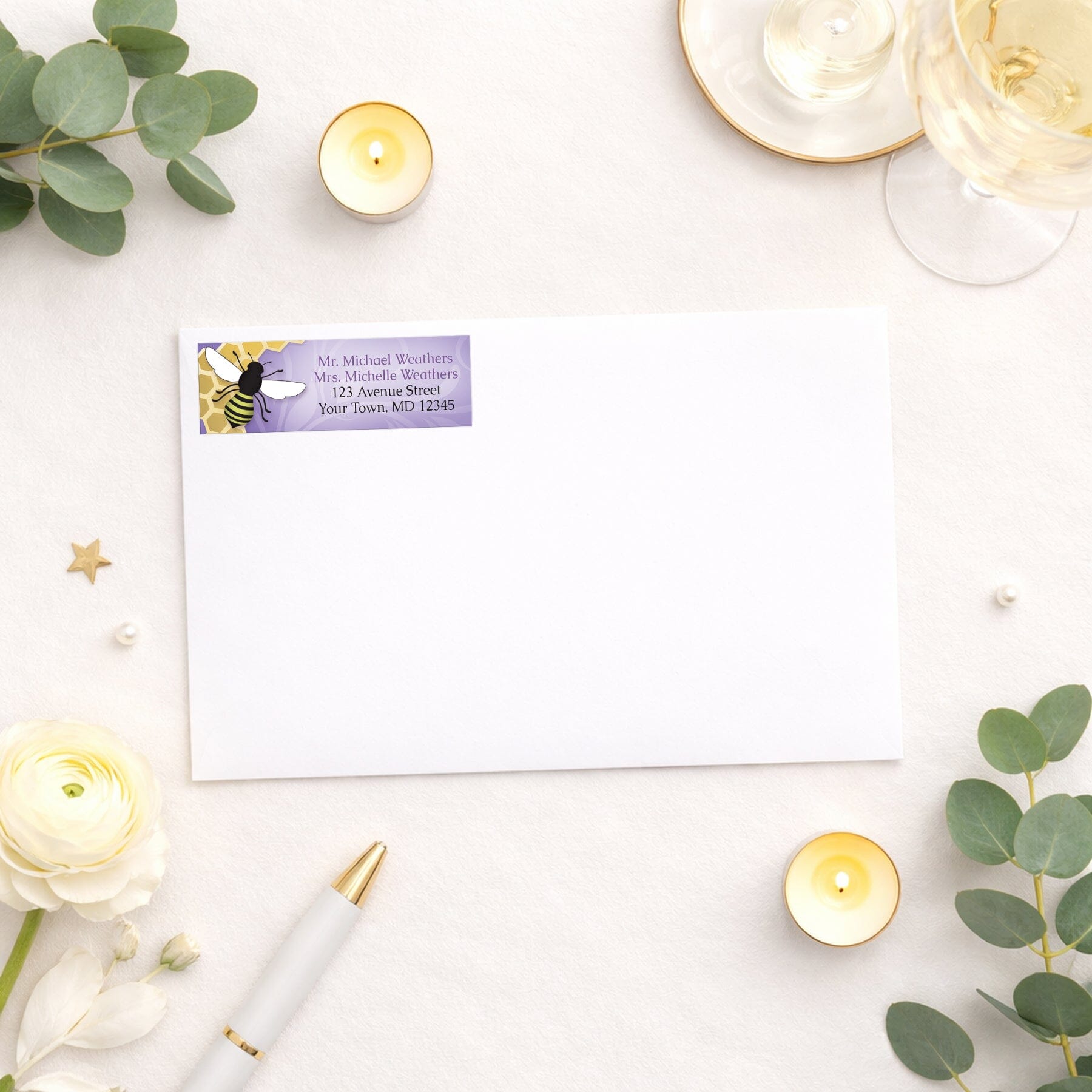 Purple Honeycomb Bee Address Label shown on a white envelope with bridal shower supplies