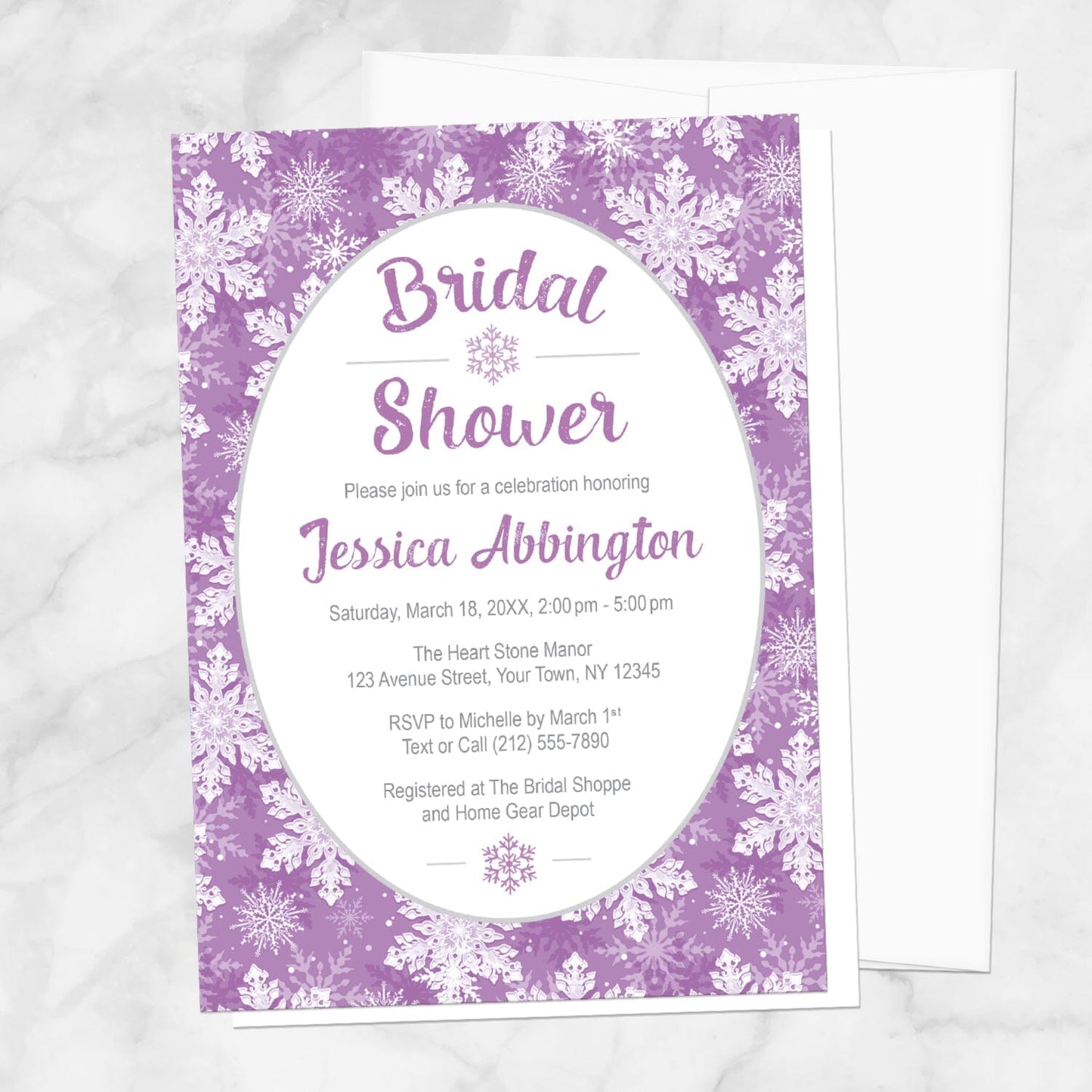 Purple Snowflake Bridal Shower Invitation shown on a marble surface with a white envelope.