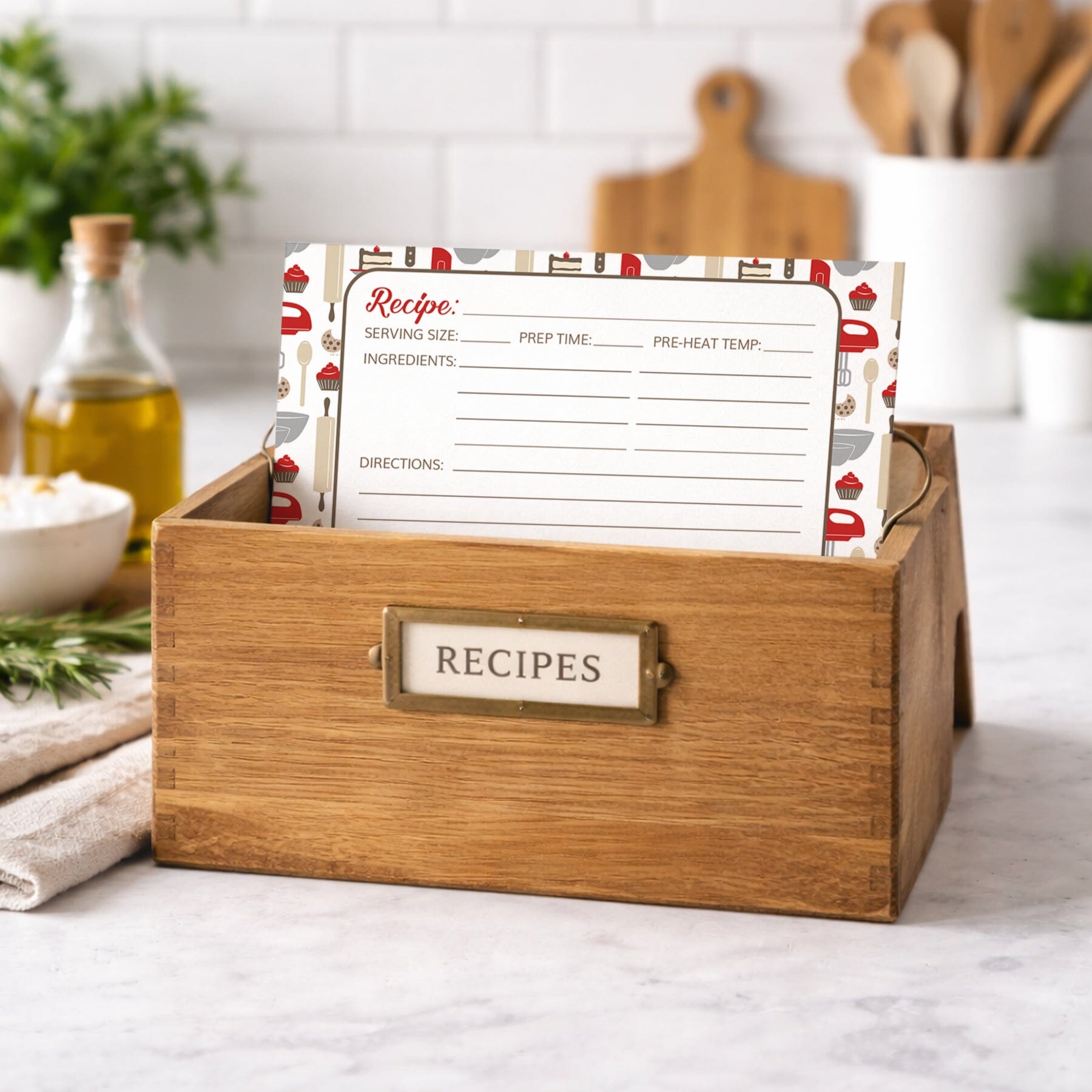 Wooden recipe box with Red Baking Pattern Recipe Cards on a kitchen counter