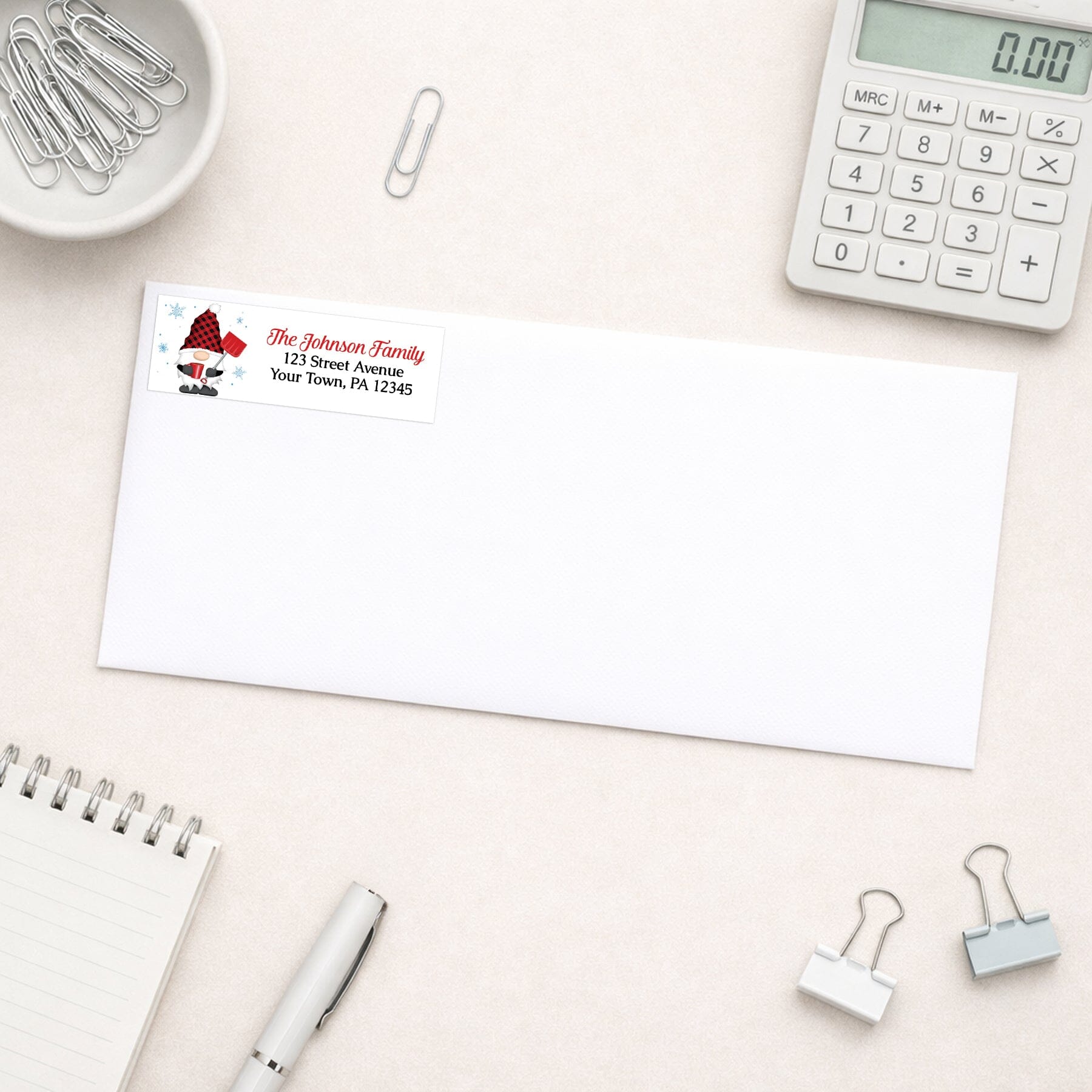 Red Buffalo Plaid Gnome Address Label shown on a white envelope with office supplies