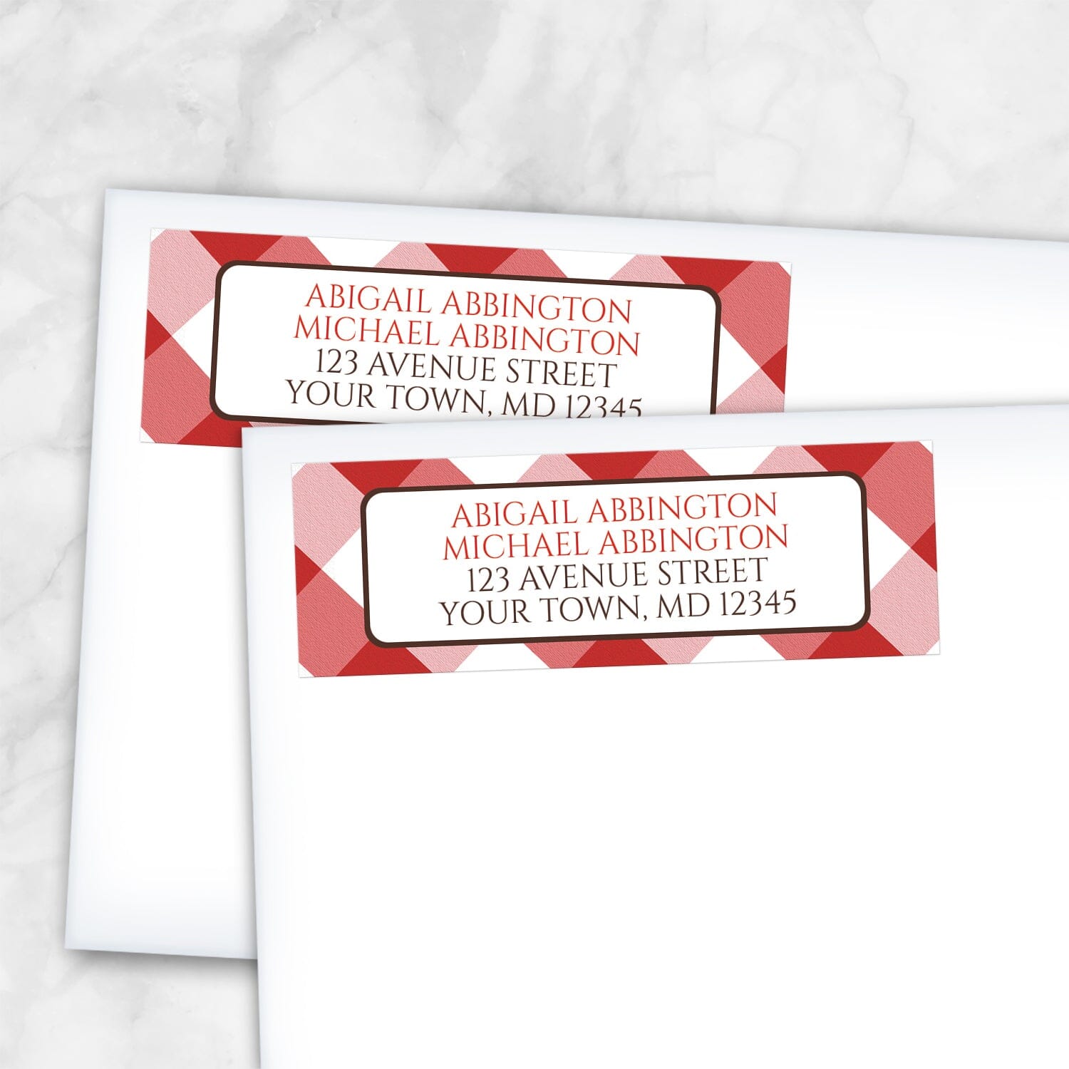 2 Red Gingham Address Labels shown on white envelopes on a marble surface