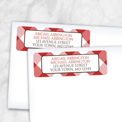 2 Red Gingham Address Labels shown on white envelopes on a marble surface