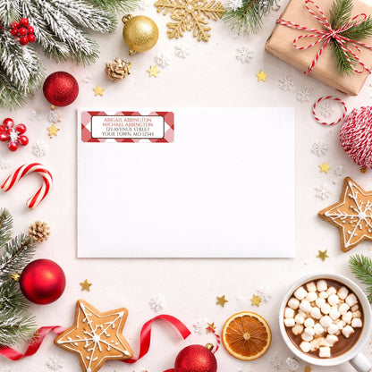 Red Gingham Address Label shown on a white envelope with winter Christmas holiday supplies