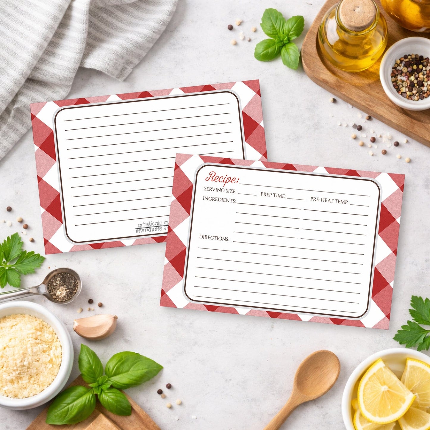 Two Red Gingham Recipe Cards on a kitchen counter with ingredients.