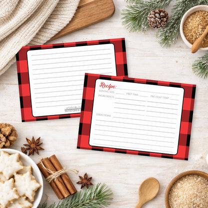 Two Red and Black Buffalo Plaid Recipe Cards on a festive wood countertop background with holiday cookies, cinnamon, and winter pine branches.