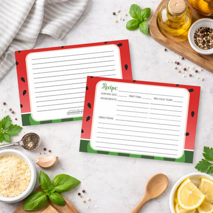 Two Red and Green Watermelon Recipe Cards on a kitchen counter with ingredients.
