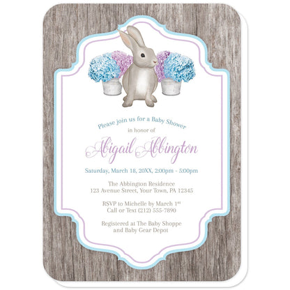 Rustic Purple Blue Hydrangea Rabbit Baby Shower Invitations (with rounded corners) at Artistically Invited. Rustic purple blue hydrangea rabbit baby shower invitations with a watercolor-inspired illustration of cute little brown bunny rabbit with purple and blue hydrangea floral arrangements in tin buckets. Your personalized baby shower celebration details will be custom printed in purple, blue, and brown in the white frame area, outlined with purple and blue, over a rustic brown wood background.