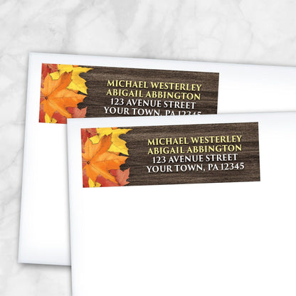 2 Rustic Autumn Leaves Wood Address Labels shown on white envelopes on a marble surface