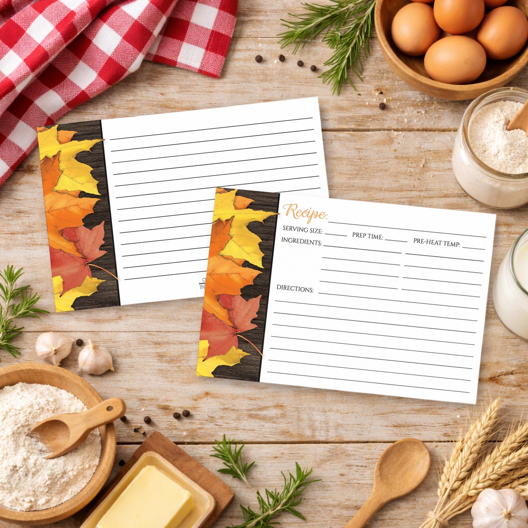 Set of Rustic Autumn Leaves Wood White Recipe Cards on a country wooden table with cooking ingredients.