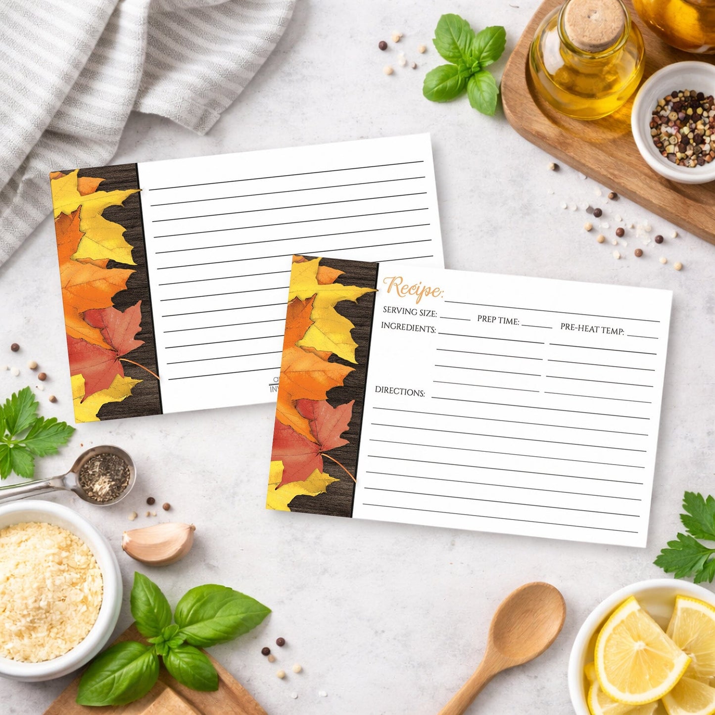 Set of Rustic Autumn Leaves Wood White Recipe Cards on a kitchen counter with ingredients.