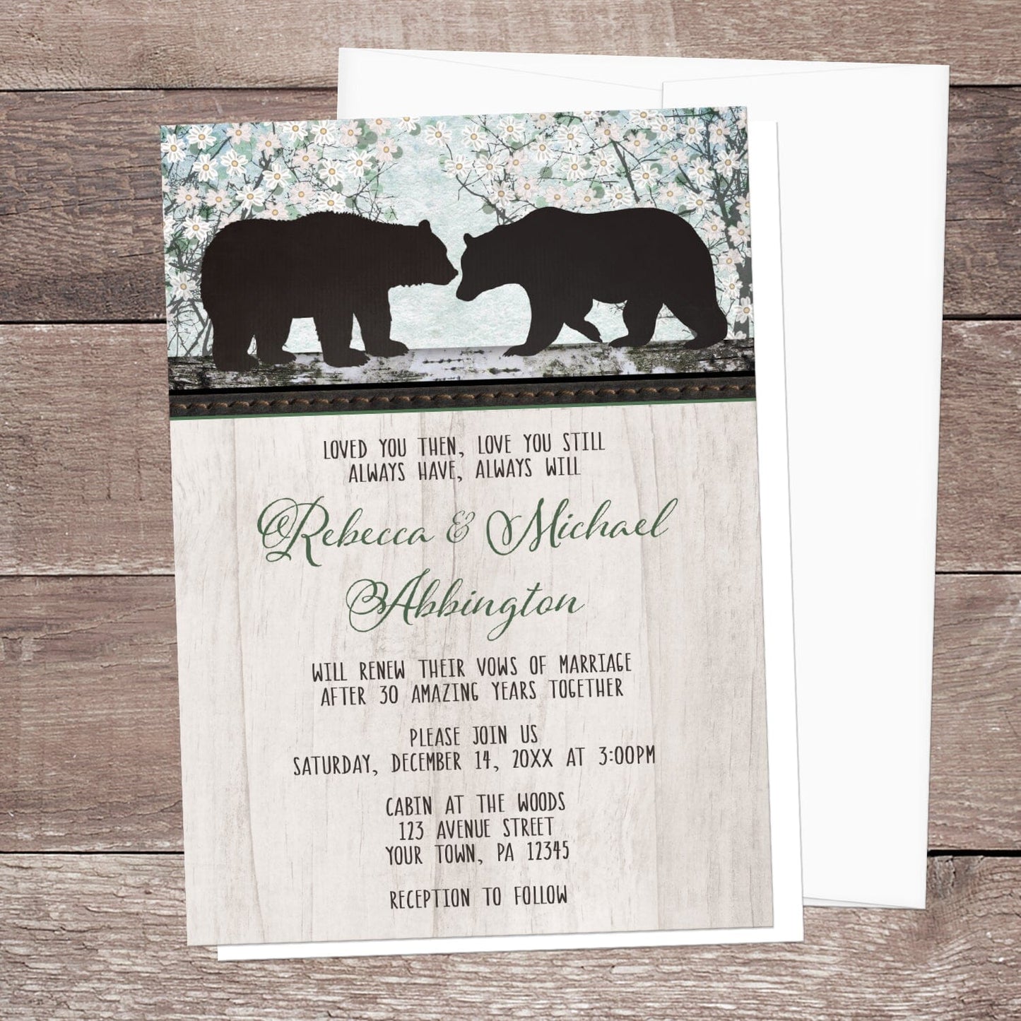 Rustic Bear Floral Wood Vow Renewal Invitation shown on a brown wood surface with a white envelope.