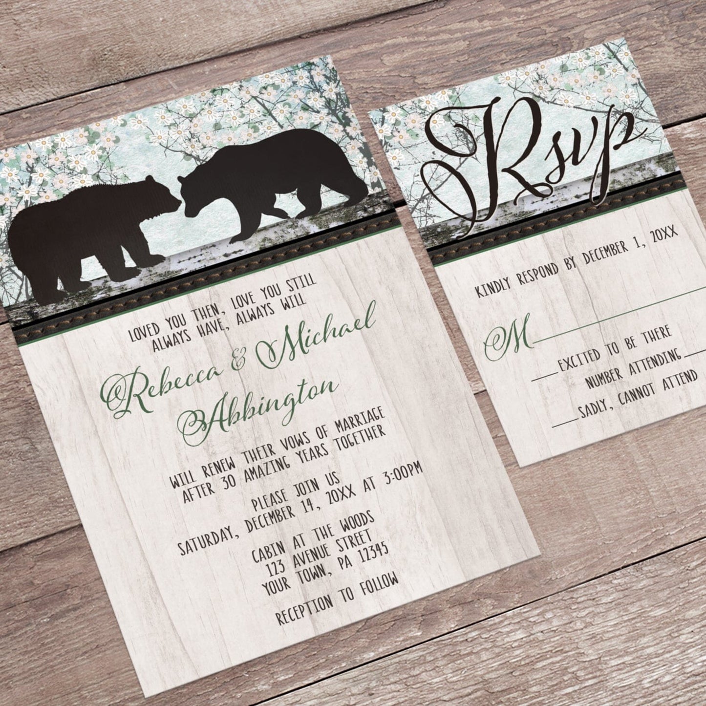 Rustic Bear Floral Wood Vow Renewal Invitation shown at an angle on a brown wood surface with the matching RSVP card.