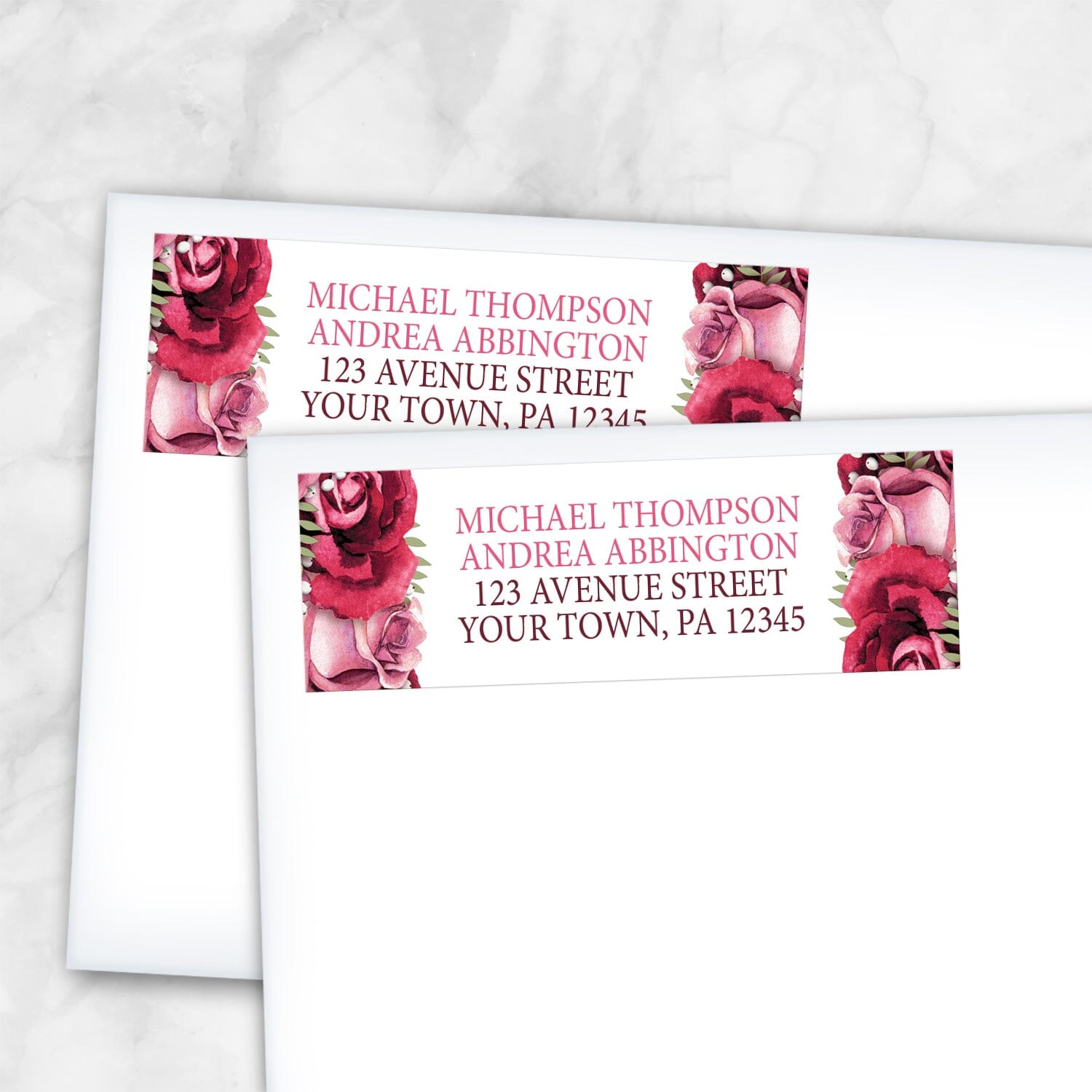 2 Rustic Burgundy Pink Rose White Address Labels shown on white envelopes on a marble surface
