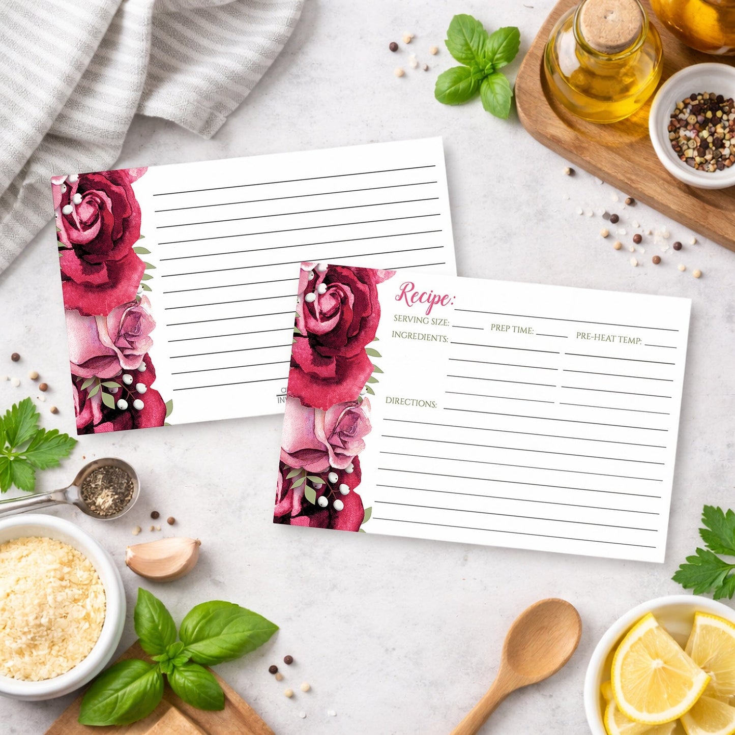 Floral-themed Rustic Burgundy Pink Rose White Recipe Cards on a kitchen counter with ingredients and utensils.
