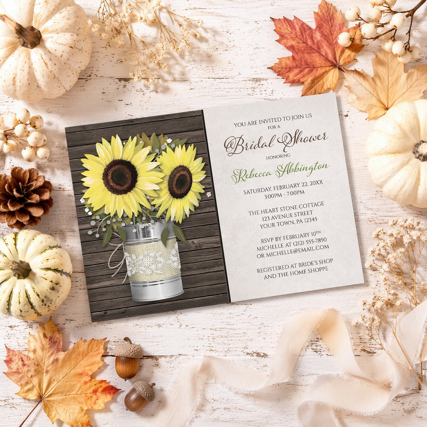Rustic Burlap and Lace Tin Can Sunflower Bridal Shower Invitation on a wooden surface with fall leaves and autumn decorations.