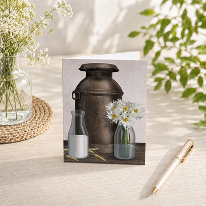 Rustic Country Dairy Farm Note Card shown on a tabletop with a vase, spring and summer flowers, and a pen.