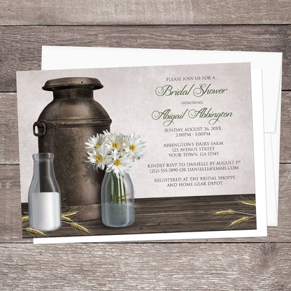 Rustic Country Dairy Farm Bridal Shower Invitation shown on a wooden surface with a white envelope.