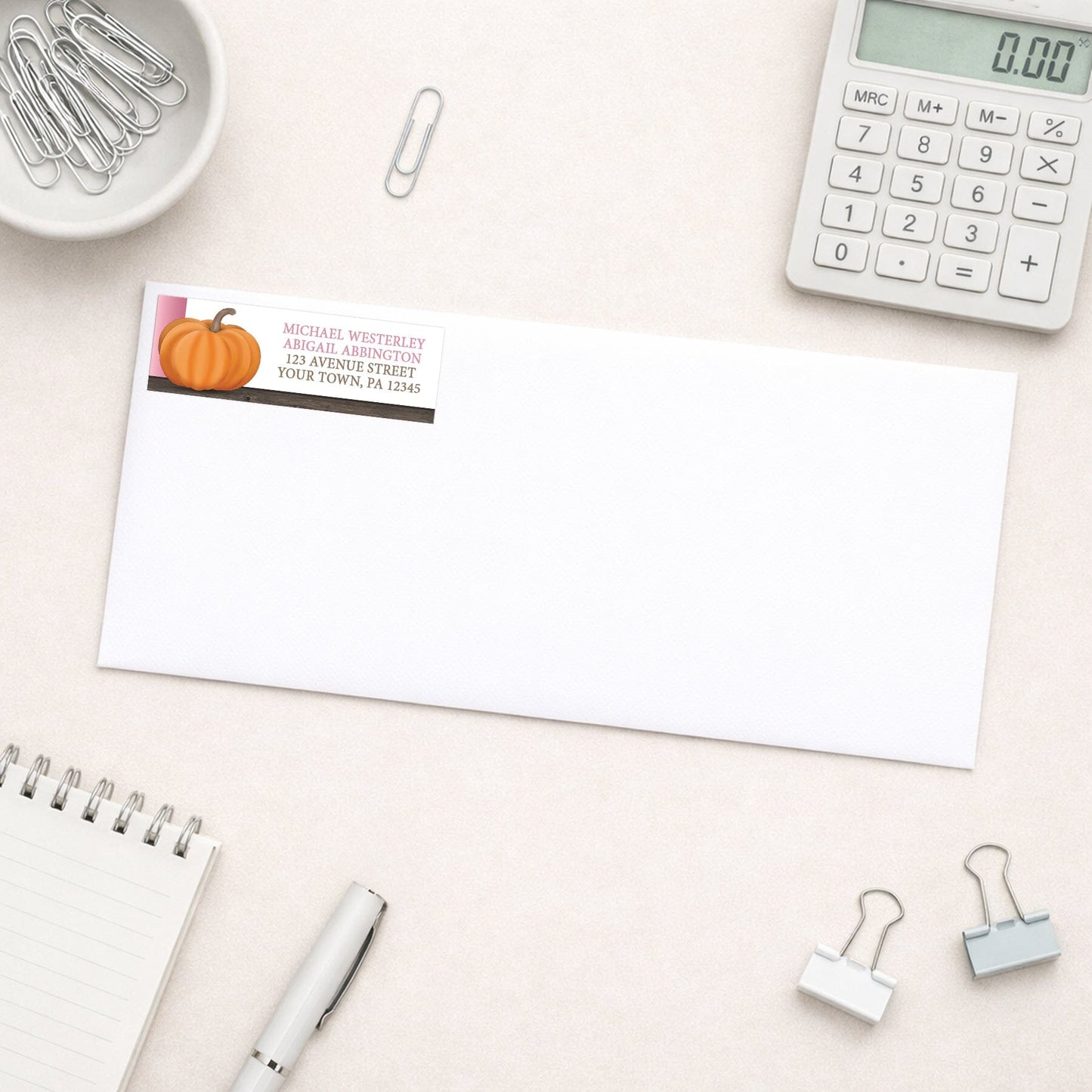 Rustic Orange Pink Pumpkin Address Label shown on a white envelope with office supplies