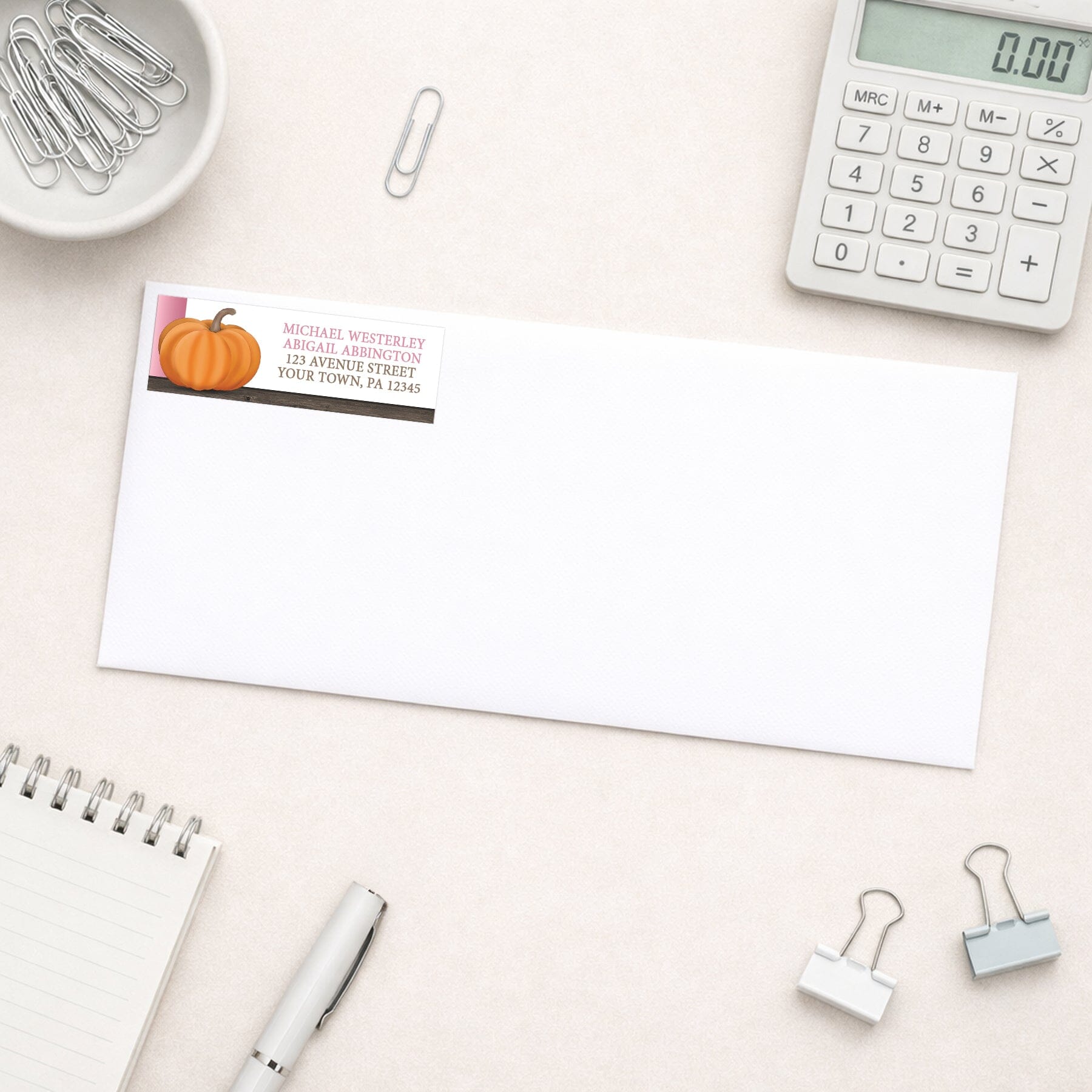 Rustic Orange Pink Pumpkin Address Label shown on a white envelope with office supplies