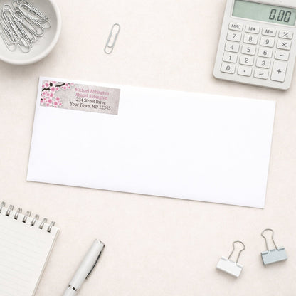 Rustic Pink Cherry Blossom Address Label shown on a white envelope with everyday office supplies