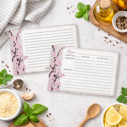 Rustic Pink Cherry Blossom Recipe Cards on a kitchen counter with everyday cooking ingredients