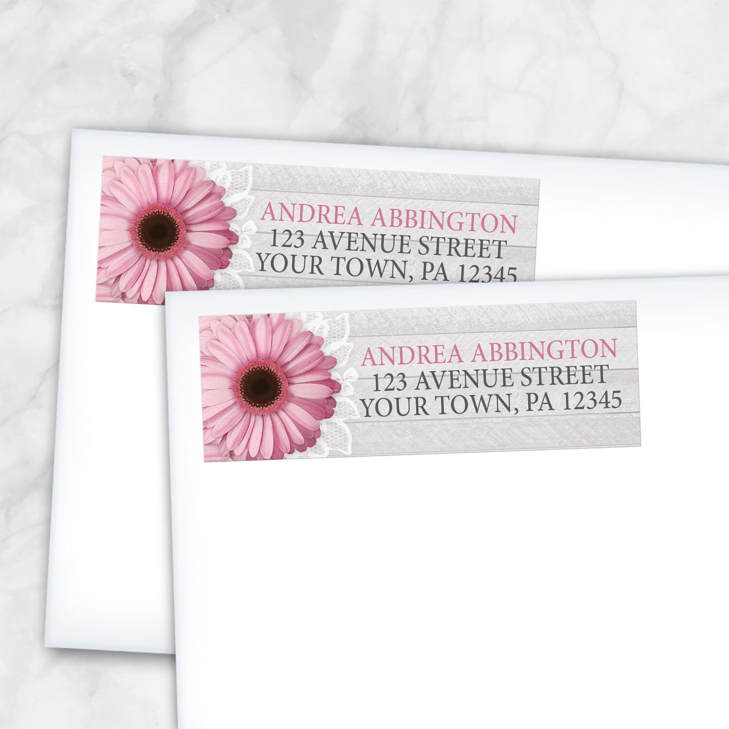2 Rustic Pink Daisy Gray Wood Address Labels shown on white envelopes on a marble surface