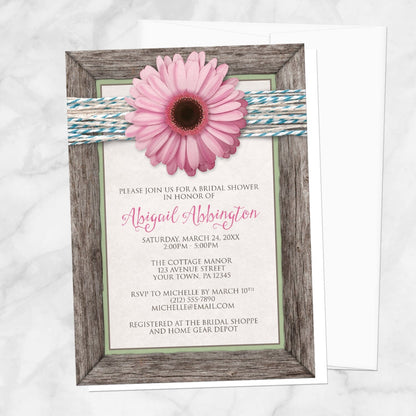 Rustic Pink Daisy Turquoise Wood Bridal Shower Invitation shown on a marble surface with a white envelope.